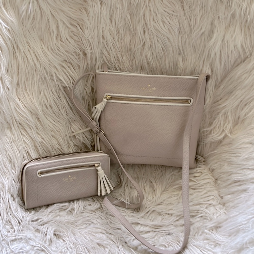 Pale pink with white trim Kate spade pocket book and wallet